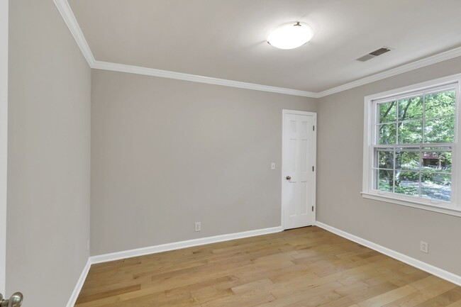 Secondary bedroom has walk-in closet. - 153B Woodmont Blvd