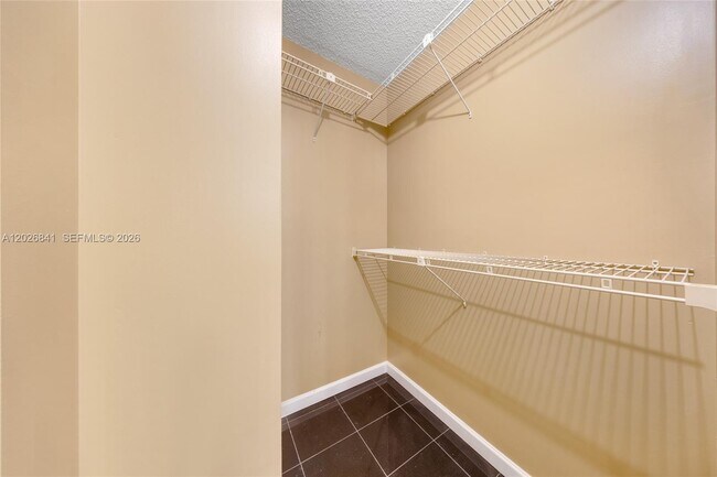 Building Photo - 6075 N Sabal Palm Blvd