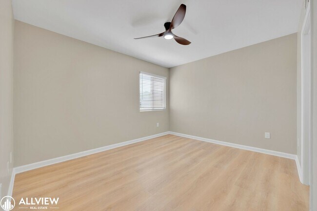 Building Photo - Beautifully Renovated 2-Bedroom Corner Tow...