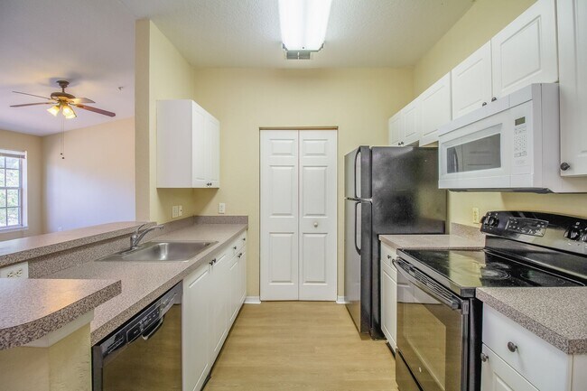 Building Photo - MOVE IN BY MAY 15th and GET 2 WEEKS OFF YO...
