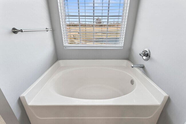 Building Photo - Stunning 4-Bedroom Home with Serene Pond Views