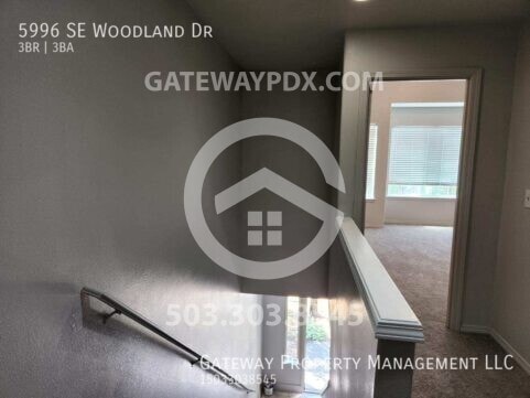 Building Photo - 5996 SE Woodland Dr