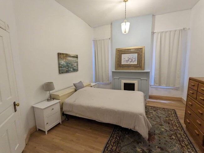 Bedroom 2 is about 14'x12' so plenty of room, yet with lots of drawers to put things away. - 1816 W Grace St