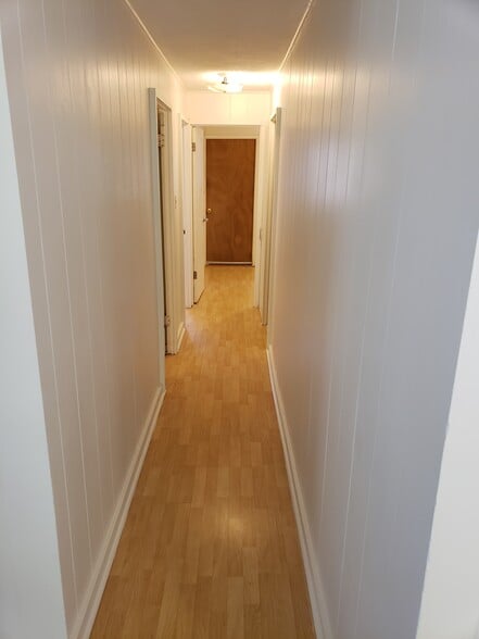 Unit C- View of the hallway to bedrooms and bathroom. - 47 -411 Kamehameha Hwy