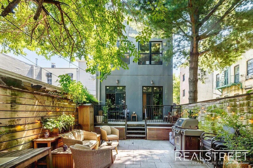 Building Photo - Modern Bushwick 2-bedroom, 2.5-bath duplex with private garden, deck, and finished recreation room —