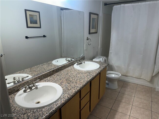 Building Photo - 5055 W Hacienda Ave