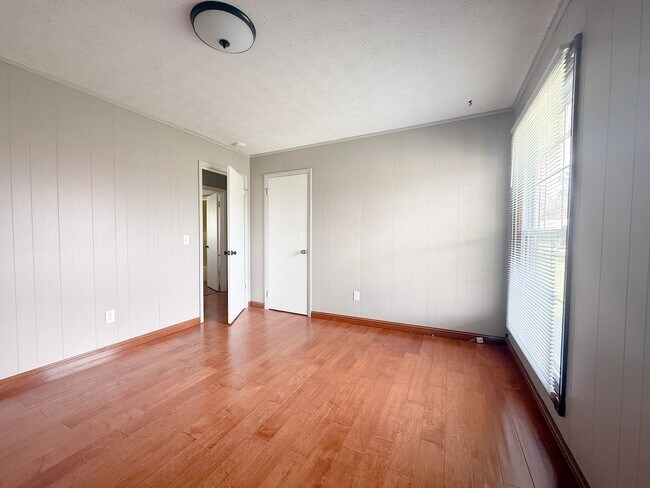 Building Photo - Spacious 3-Bedroom Home with Huge Yard, Covered Porches & Storage Building