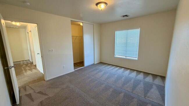 Building Photo - Two Story Home with NEW tile and a large backyard!