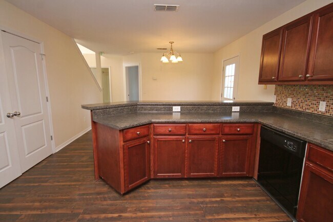 Building Photo - Spacious 4BR Home in Robin's Ridge with Soaring Ceilings, Guest Suite & Two-Car Garage