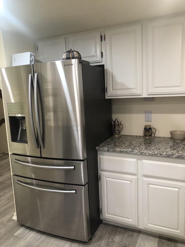 Kitchen and refrigerator - 1243 E Kimberley Ln