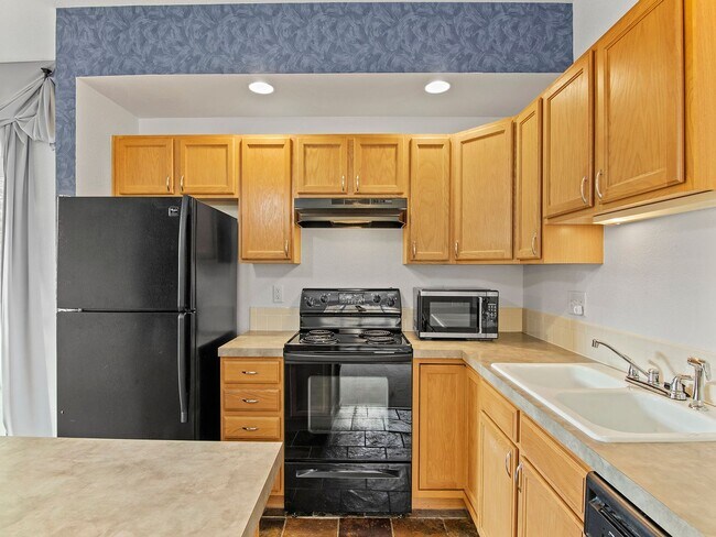 Building Photo - Charming 2 bed 2 bath Condo Near Centerra!