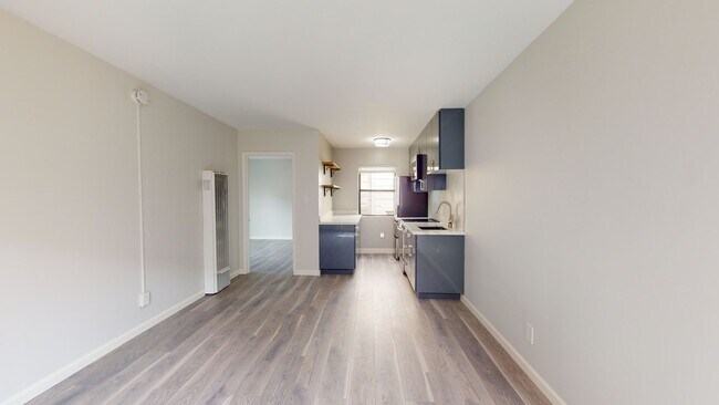Building Photo - Remodeled modern 1 bedroom end unit, close...