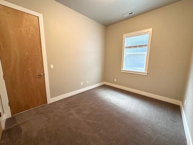 Building Photo - Rarely available in the most preferred River District! Available July 2026