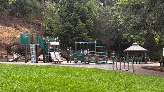 Building Photo - Stunning Tree-House Living with Beach Acce...