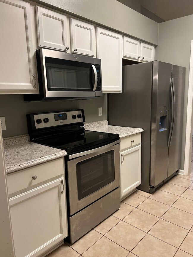 Building Photo - Four bedroom with a fenced in yard!