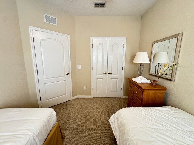 Building Photo - Fully Furnished 5-Bed End-Unit Townhome with Hot Tub in Gated Coral Cay! WASHER & DRYER INCLUDED!