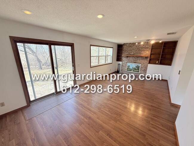 Building Photo - Shoreview House Available Now, Updated Kitchen & Baths, Open Floor Plan, Family Room, Mounds View...