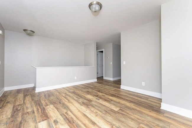 Building Photo - Spacious 3BR Duplex with Finished Basement & 2-Car Garage in Otsego