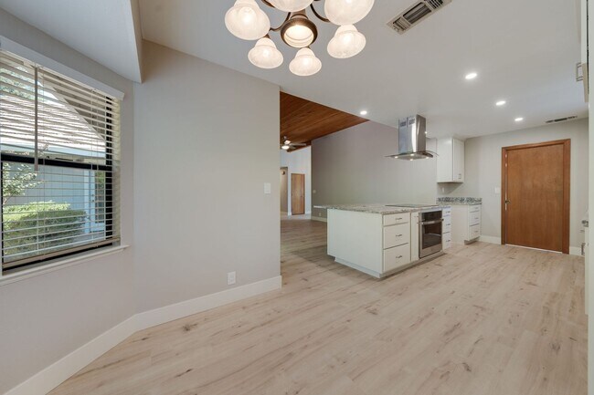 Building Photo - Bright and Stylish 4BD/2BA Home with 3 Car...