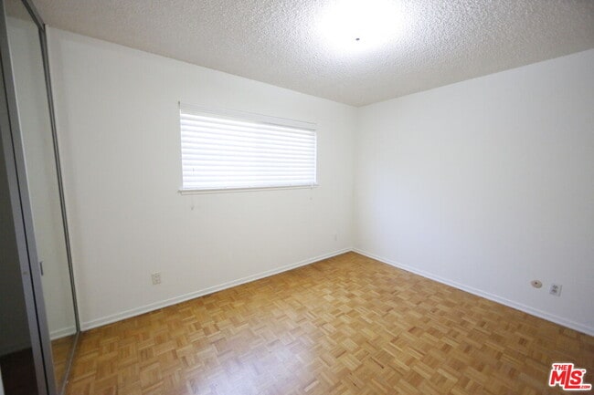 Building Photo - 7309 Asman Ave