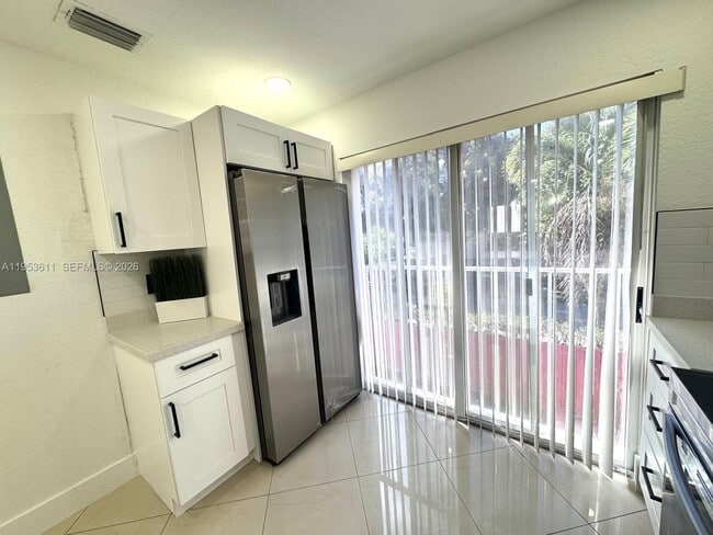 Building Photo - 5655 NW 109th Ave