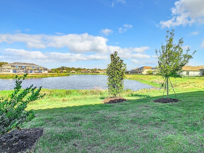 Building Photo - AVAILABLE NOW! 3/2.5 Townhome For Rent in Bellalago!