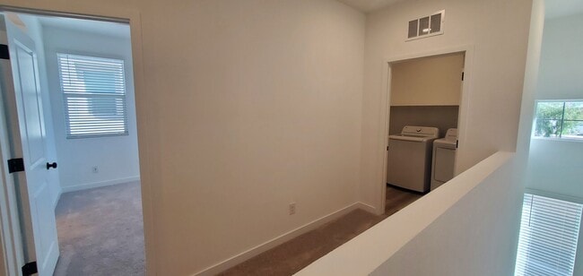 Building Photo - Beautifully designed modern townhome with attached garage.