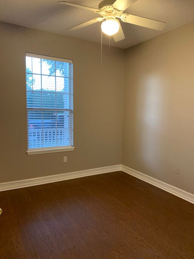 Building Photo - MOVE IN SPECIAL- Charming 3/2 home w/ formal office/4th bedroom and fenced yard in Harmony