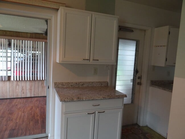 Building Photo - Port Charlotte Annual Rental. 2 bed, 2 bath, 1 carport