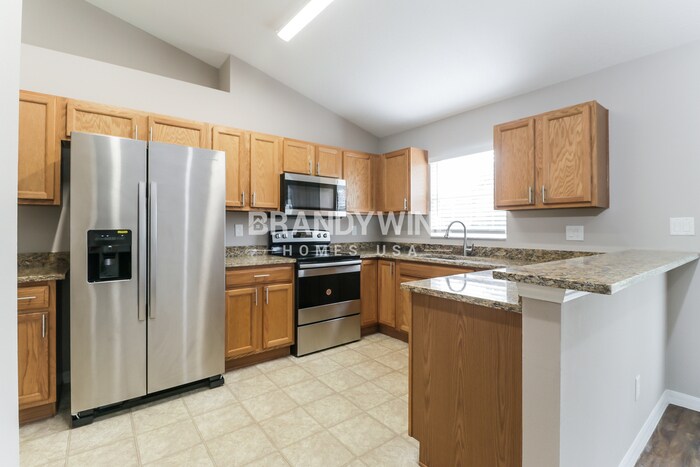 Building Photo - 6272 Layton Ave