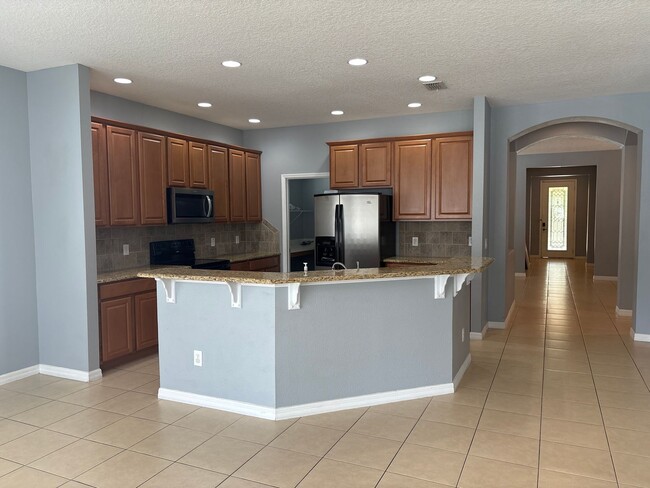 Building Photo - Beautiful 4-Bedroom Home in the Gated Water’s Edge Community/Lake Nona