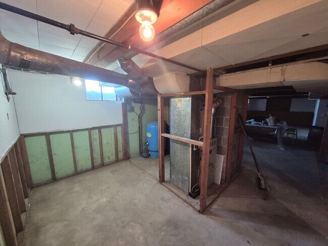 Building Photo - Refurbished home with Basement and large yard