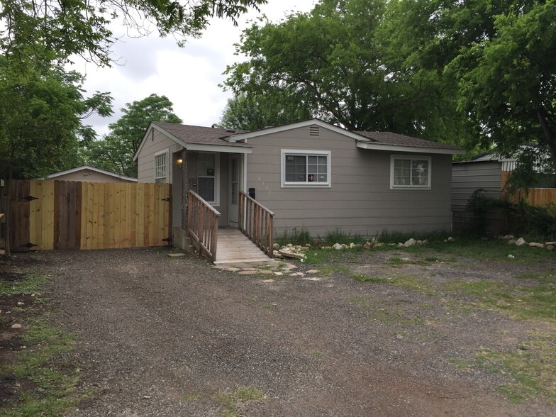 Plenty of off street parking, plus detached storage/laundry behind fence - 2323 Basse Road