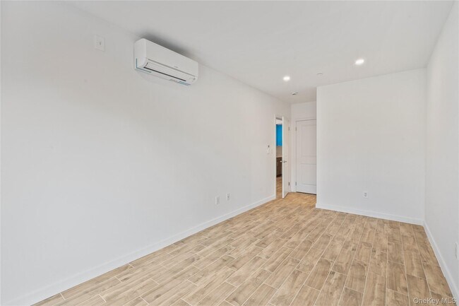 Building Photo - 213-41 38th Ave