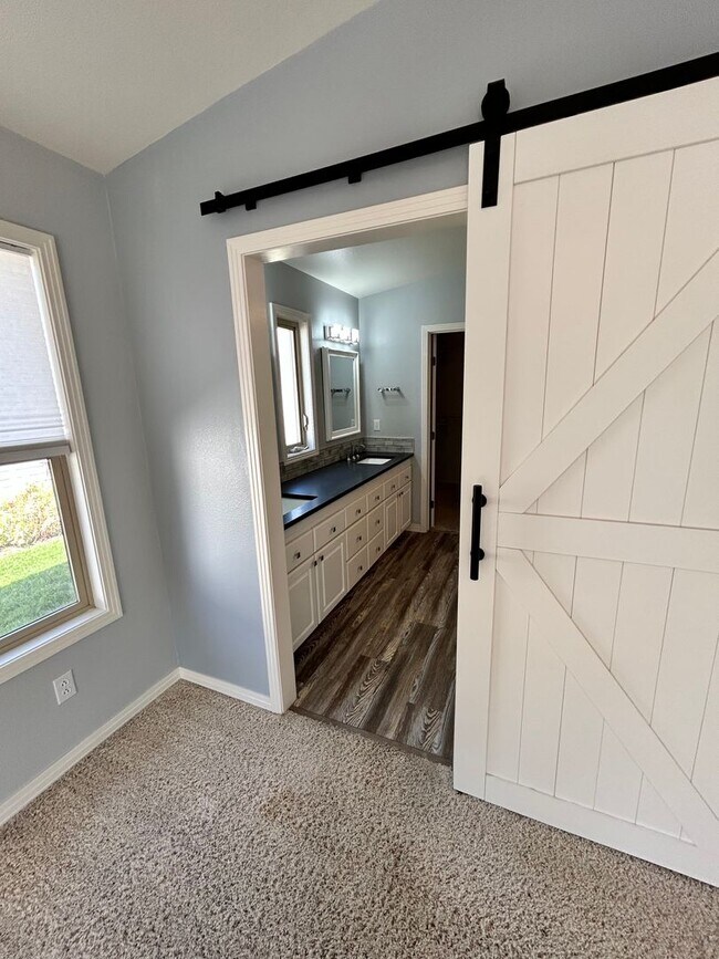 Building Photo - Spacious Duplex with 3-Car Garage & Private Patio!