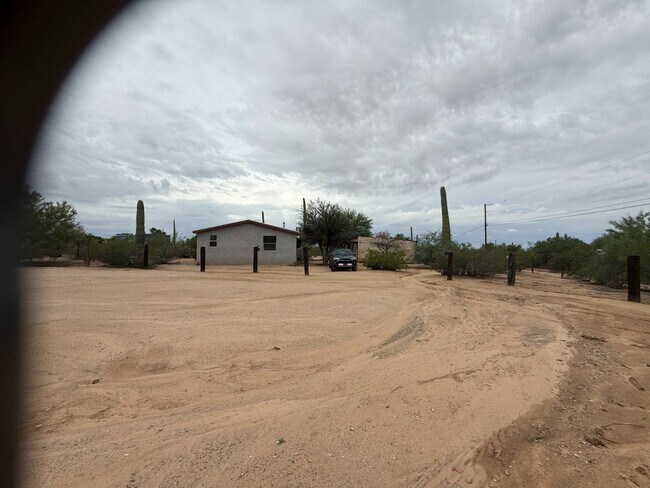 Building Photo - 6575 N Pelto Path