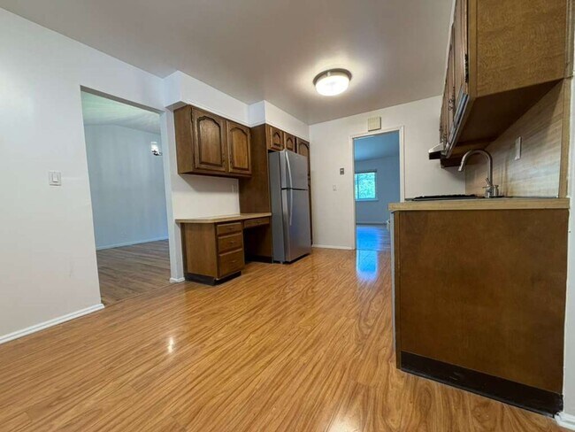 Building Photo - Spacious 4-Bedroom Home with Functional Layout, Backyard Access & Attached Garage