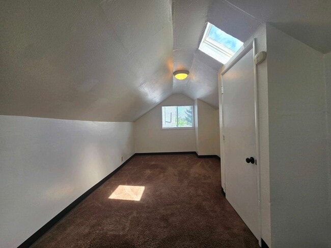 Building Photo - Cozy 2 Bed, 2 Bath Home with Parking Spaces and a Fenced Backyard!