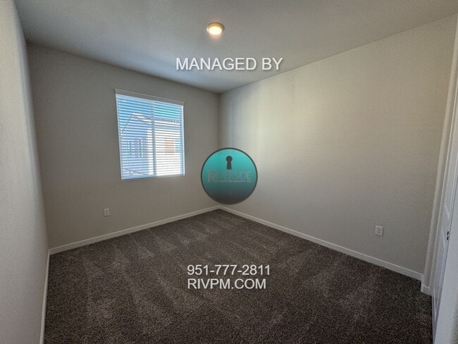 Building Photo - New Build Gem! Modern Three-Bedroom Condo with Bright Open Layout & Patio – Solar Included!