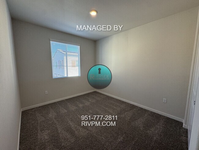 Building Photo - New Build Gem! Modern Three-Bedroom Condo with Bright Open Layout & Private Patio – Available Now!