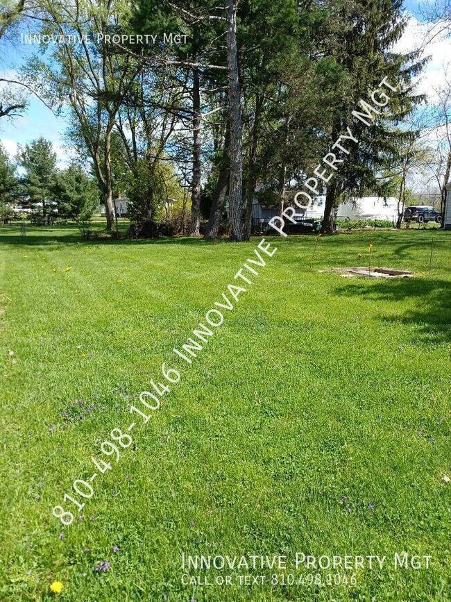 Building Photo - 5181 1/2 N. Elms-#1