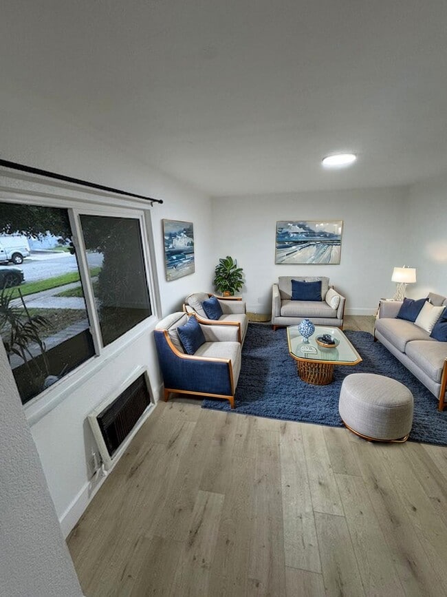 Building Photo - 8402 Larson Ave