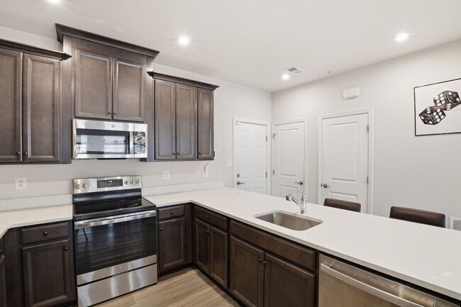 Building Photo - Step into a beautifully designed contemporary residence that exudes style and comfort at every turn.