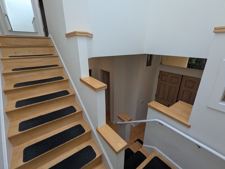 Stairway landing, overlooking front door - 2346 Cedar St