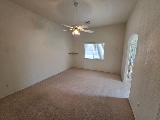 Building Photo - Spacious 3-Bedroom Home with RV Parking & 3-Car Garage in Bullhead City