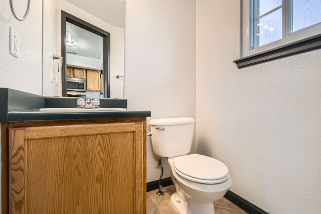 Building Photo - Modern 2-Bed Townhouse with Private En-Suites, Parking for 3 Cars  & Community Amenities