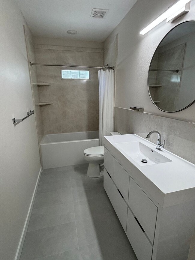 Building Photo - A MUST SEE THREE BEDROOM DUPLEX