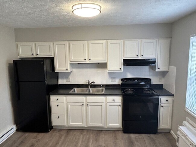 Primary Photo - Spacious 2-Bedroom Living in a Quiet Commu...