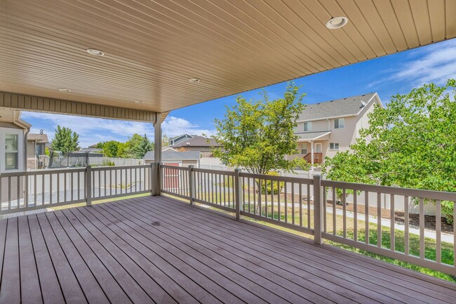Building Photo - Spacious Syracuse Home with Covered Deck, Loft & Oversized 3-Car Garage