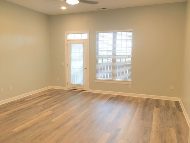 Building Photo - Inviting, modern two bedroom with garage parking, balcony views and a wonderful location in Chape...